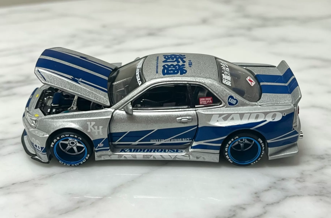 KAIDOHOUSE 1/64 Nissan Skyline GT-R R34 Malaysia Expo Silver Blue Diecast Model