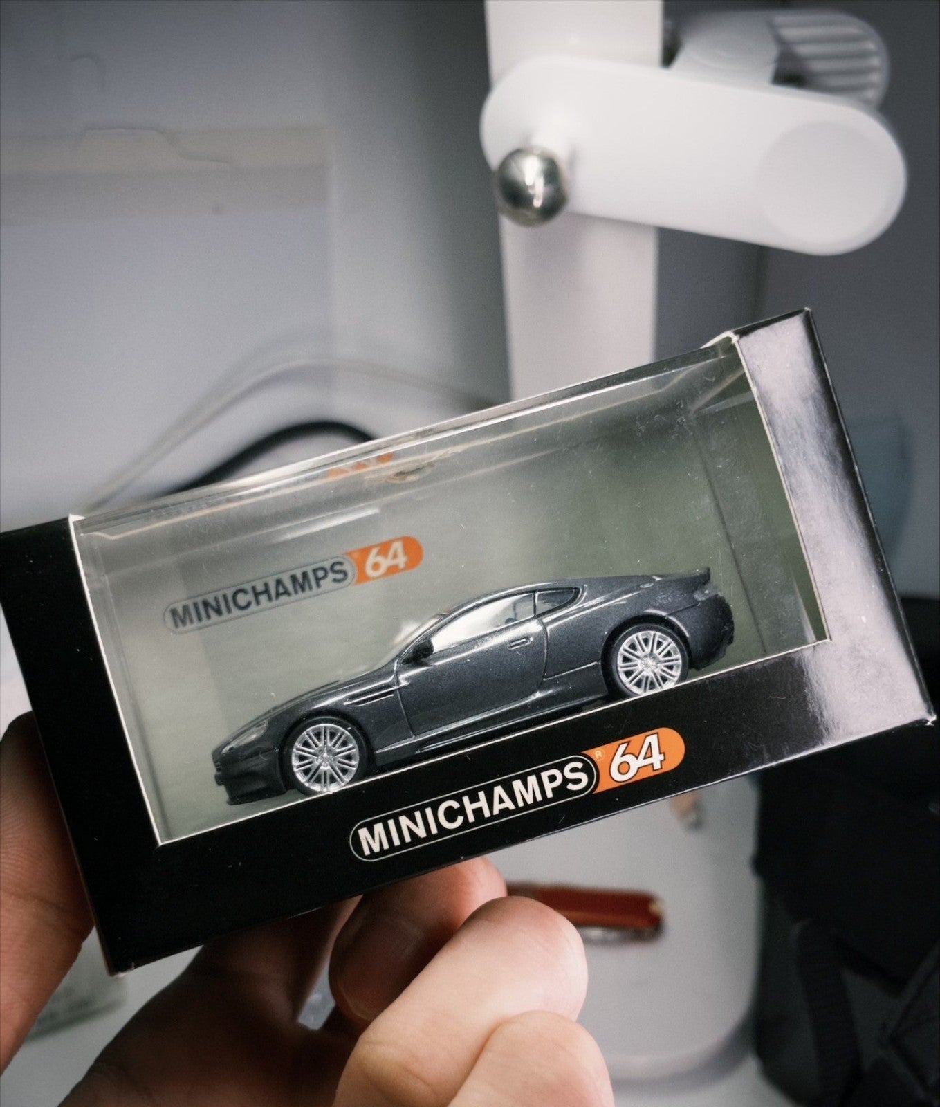 Minichamps 1/64 Aston Martin DBS 007 Grey Diecast Model