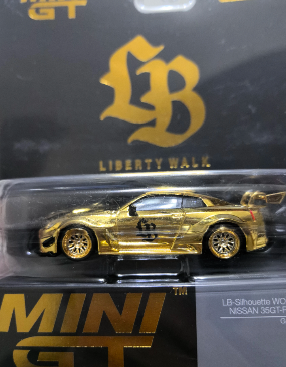 MINI GT #580 LB-Silhouette Nissan 35GT-RR Gold Plated Carded