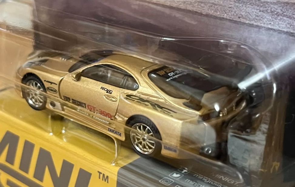 MINI GT 961 Toyota Supra A80 Top Secret GT300 Gold Smokey Nagata Signed 1:64