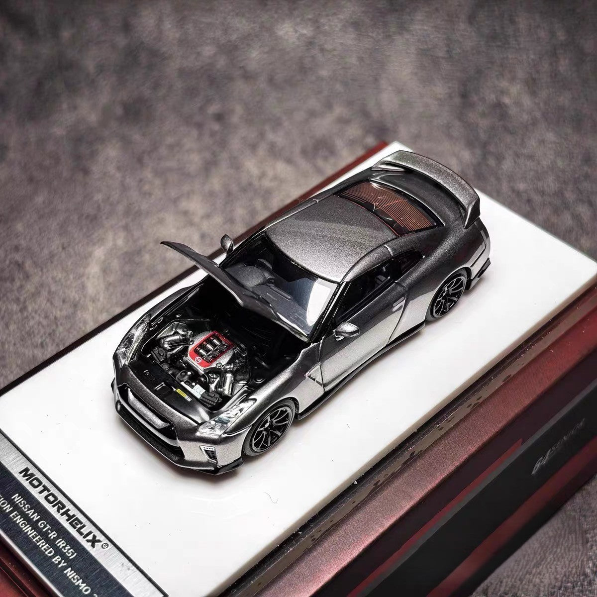 MotorHelix 1/64 Nissan GT-R R35 T-Spec Dark Metal Gray Nismo Track Edition