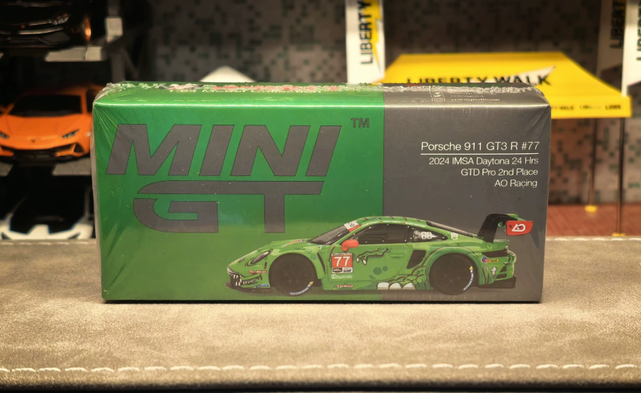 MINI GT 1/64 Porsche 911 GT3 R #77 AO Racing Rexy Daytona 24H
