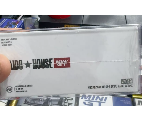 MINI GT 1/64 Nissan Skyline GT-R R34 Kaido Works Pearl White First Edition