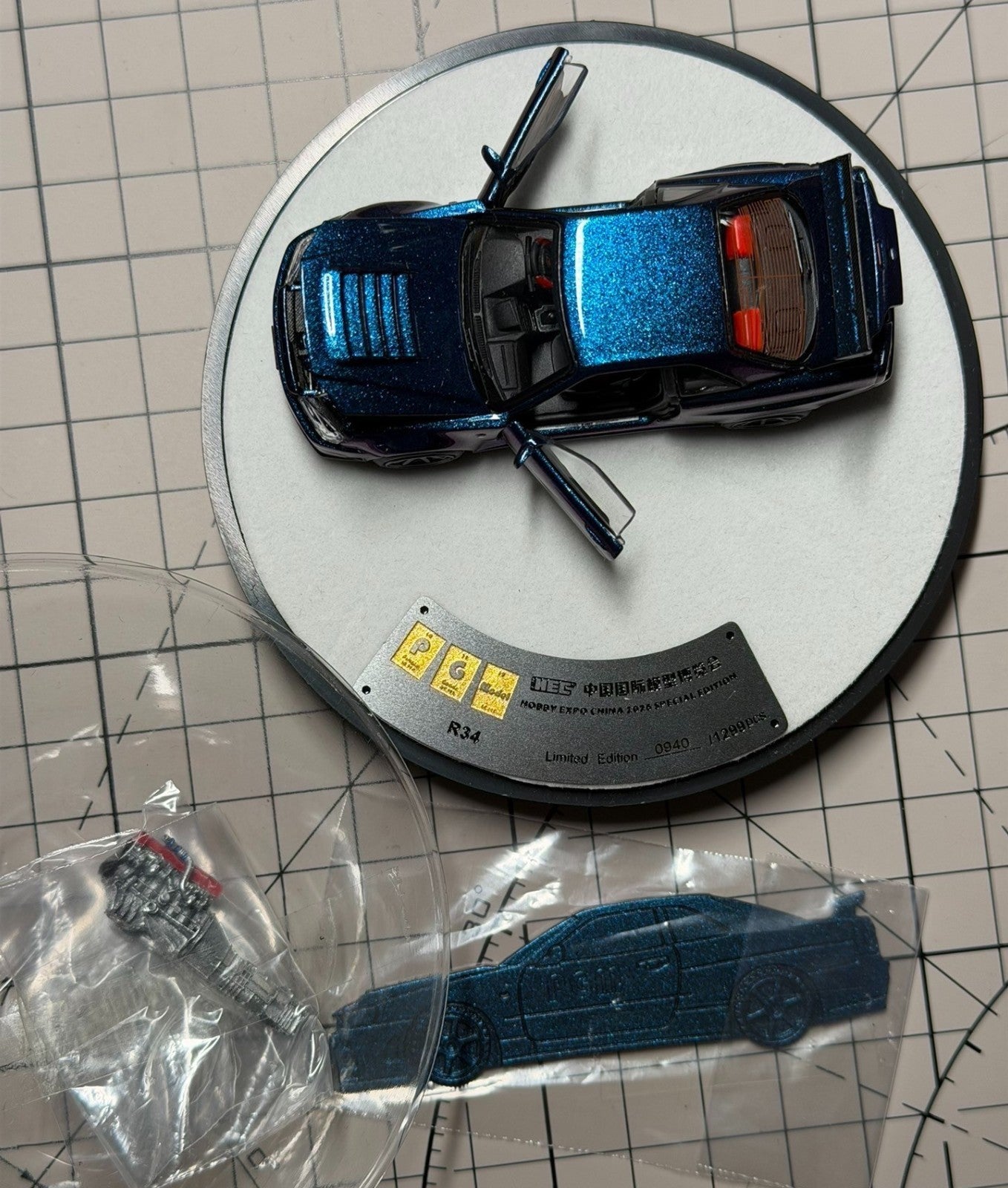 PGM 1:64 Nissan Skyline GT-R R34 Chameleon HEC 2026 Limited 1500