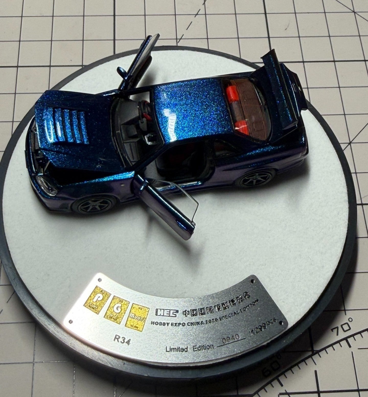 PGM 1:64 Nissan Skyline GT-R R34 Chameleon HEC 2026 Limited 1500