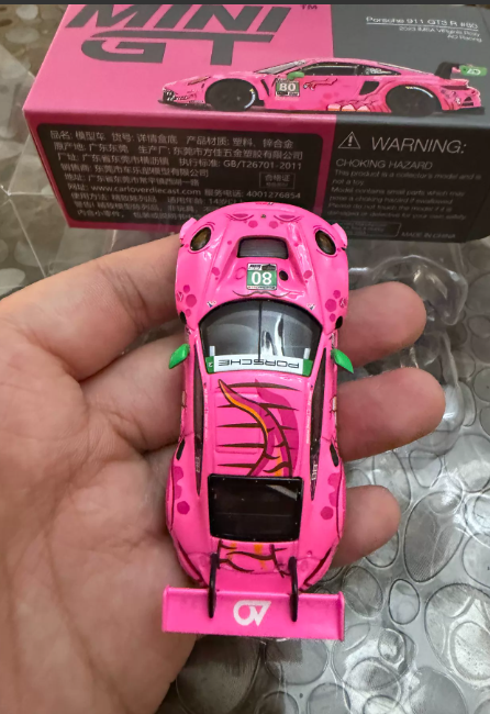 MINI GT 872 Porsche 911 GT3 R AO Racing Pink Dino IMSA 2023