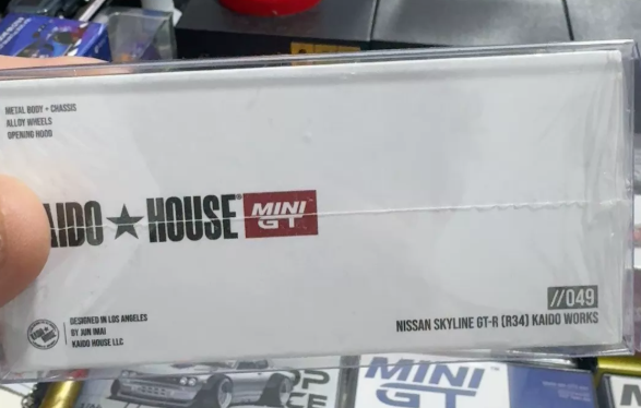 MINI GT 1/64 Nissan Skyline GT-R R34 Kaido Works Pearl White First Edition