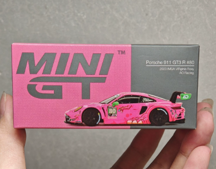 MINI GT 872 Porsche 911 GT3 R AO Racing Pink Dino IMSA 2023