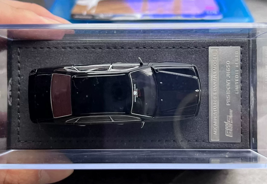 MK Miniatures 1:64 Nissan President JHG50 Shenzhen Show Black