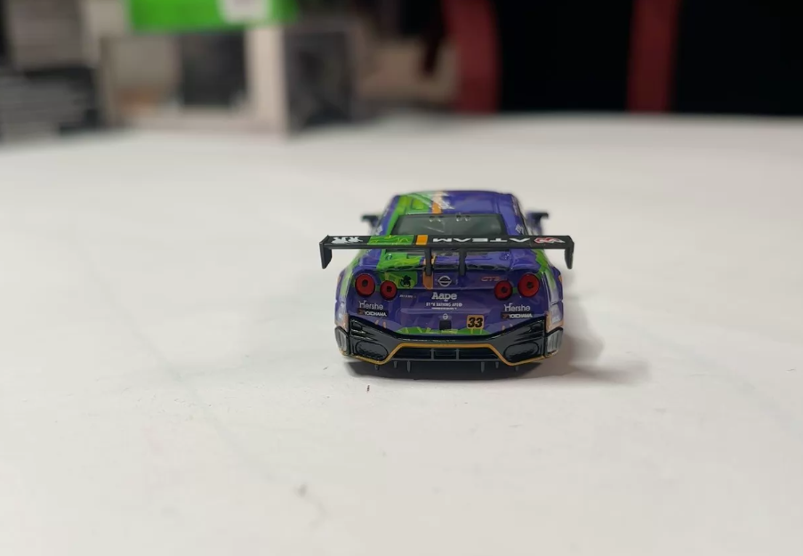 MINI GT EVA Racing x AAPE Nissan GT-R EVA-01 1/64