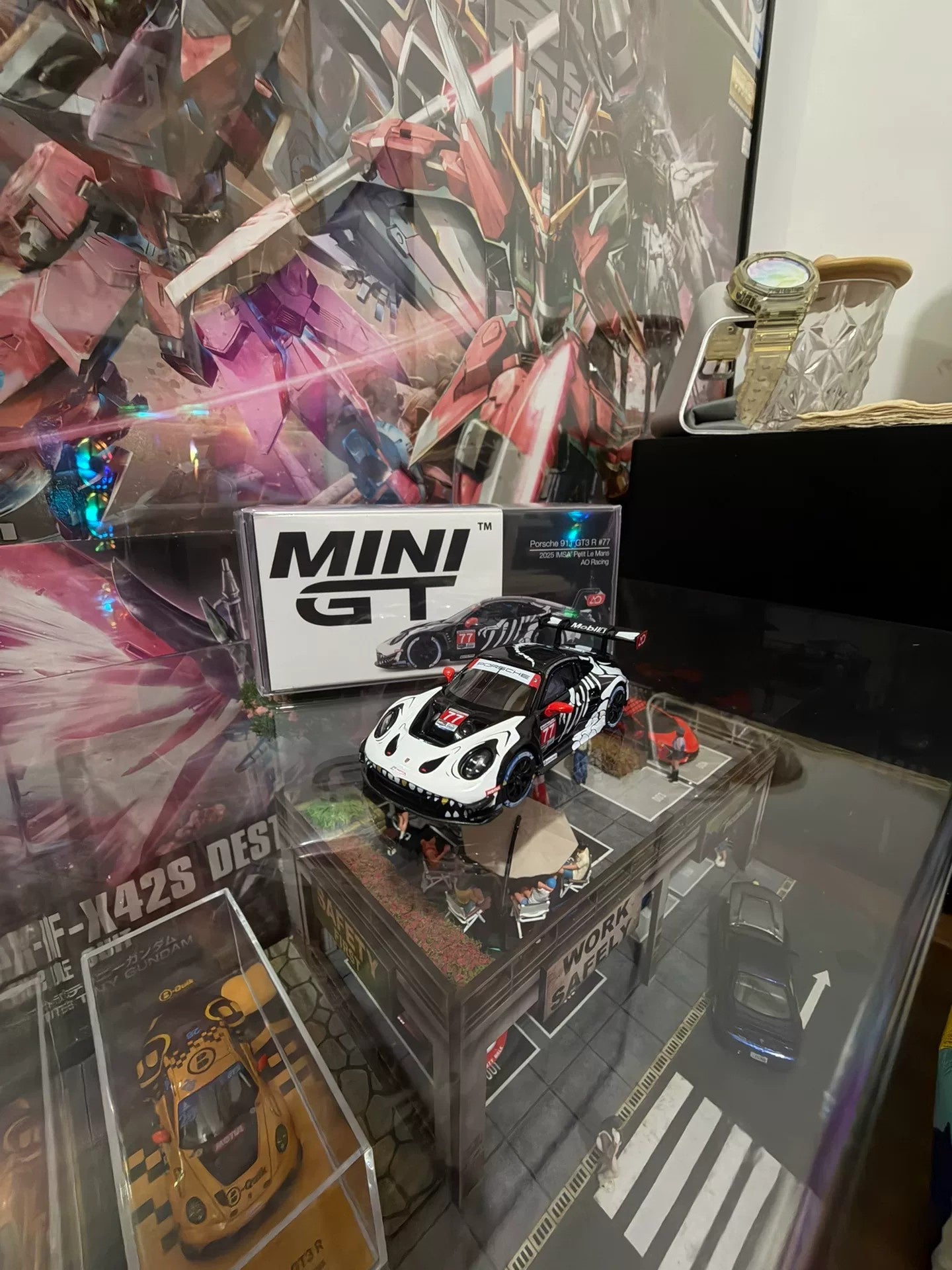 MINI GT 1/64 Porsche 911 GT3 R #77 AO Racing Skeleton Rexy