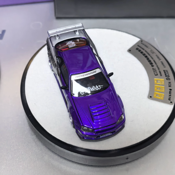 PGM 1/64 Nissan Skyline GT-R R34 HEC 2025 Candy Purple Silver