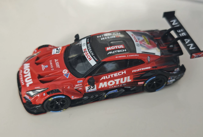 MINI GT 875 Nissan GT-R Nismo #23 MOTUL AUTECH Suzuka Winner 1/64