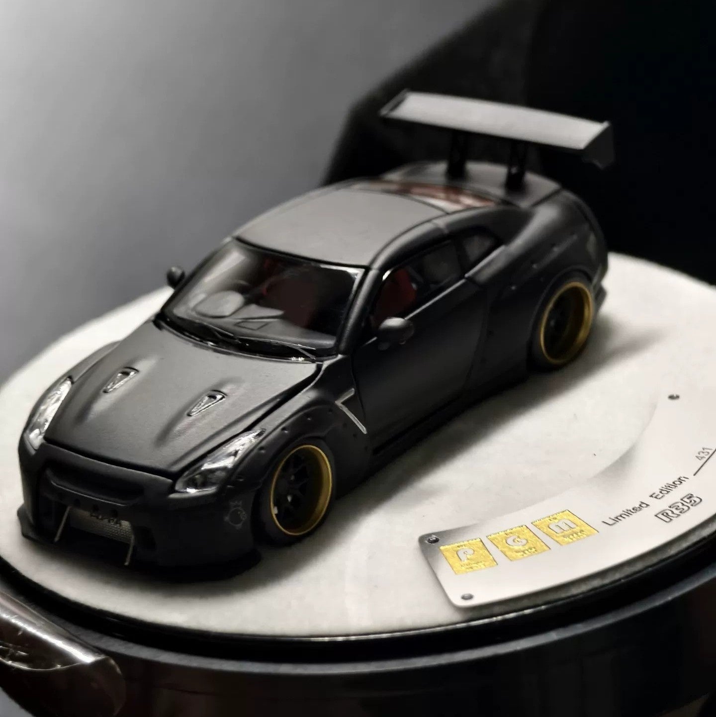 PGM 1/64 Nissan GTR R35 Matte Black Deluxe – All-Open